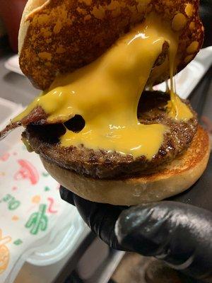 OUR CHEESEBURGER WITH BACON ON OUR SWEET SOURDOUGH BUNS