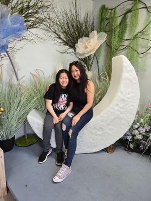 Me & Sally With Coloured Flowers While Sitting On The Moon Chair.