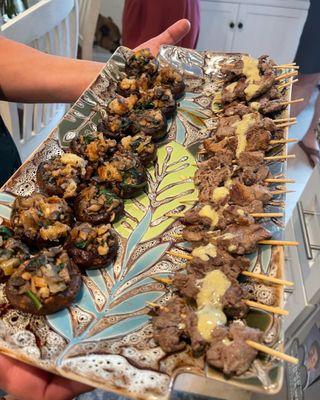 Sausage spinach stuffed mushrooms and Garlic Mustard Steak Skewers. The beef skewers were so tender and good.