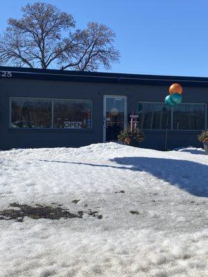 Front of the shop, plenty of street and parking lot parking