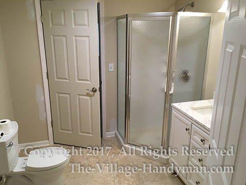 New bathroom installation in basement remodeling project.