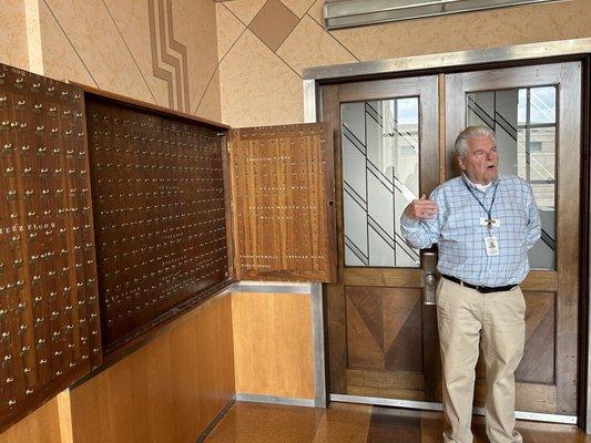 Key cabinet in the secretary's office and our tour guide, Don