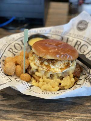 Bacon and hamburger patty, chili,Mac and cheese and a fried egg