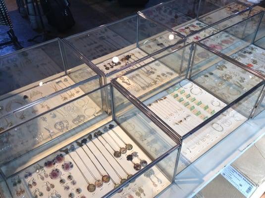 Glass cases of jewelry under $40.