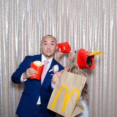 The hat was one of Theo's photobooth props. The to-go bag and French fries pictured are really from McDonalds.