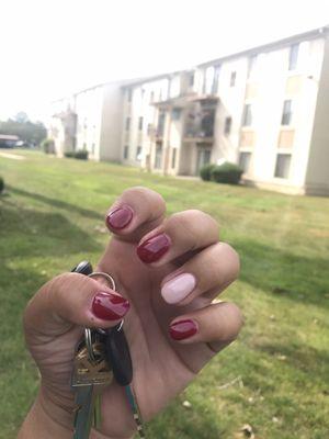 Acrylic nails. Reddish purple, oak something. Loved them