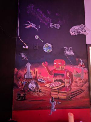 Cool wall art inside. Features a space theme with SpaceX