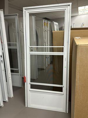 Glass storm door with sliding glass option