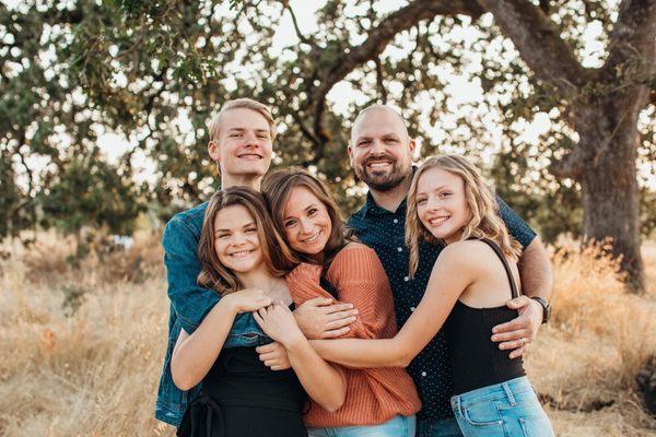 Roger and Caitlin Clary with their three children.