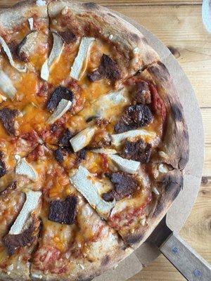 Vegan pizza with tempeh and mushrooms