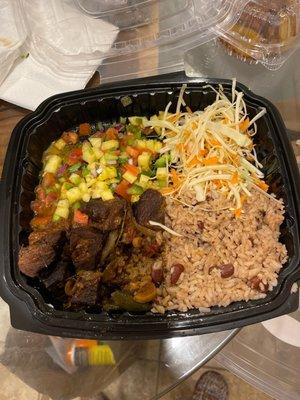 Stew Pork with cole slaw, pineapple salsa, and rice and beans