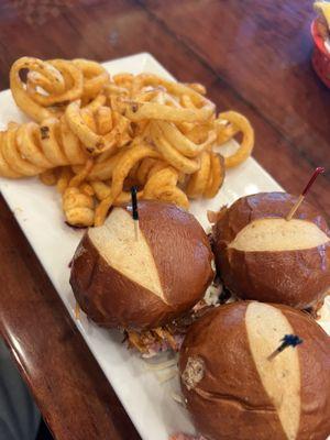 Pulled pork sliders w/curly fries and fry sauce.