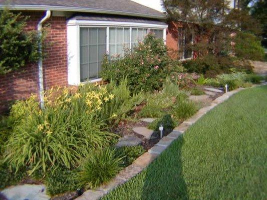 flower bed and sprinkler landscaping