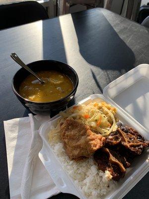 Oxtail lunch special with a piece of fry chicken and chicken soup.