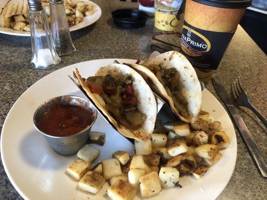 Breakfast tacos (made vegan) and potatoes