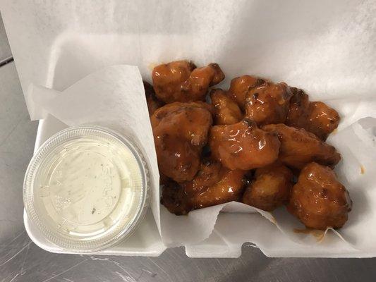 A full order of Buffalo boneless wings with a side of homemade ranch!! Wow