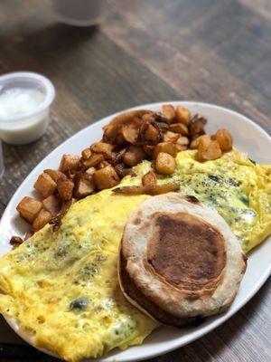 Veggie omelet with hash browns and English muffin