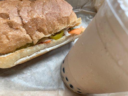 chai tea bubble tea and a banh mi grilled chicken