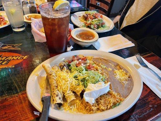 Chicken Taquitos with rice and beans. Excellent service by Jesse!