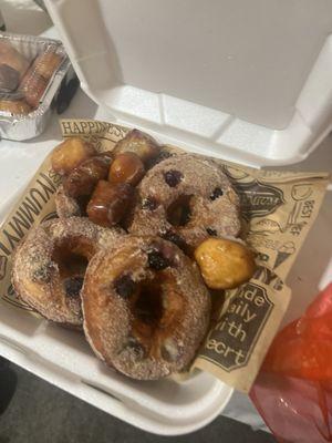 Fresh blueberry donuts and glazed donut holes