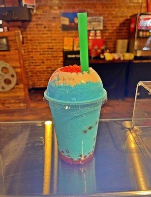 Blue raspberry smoothie with strawberry Bobo balls