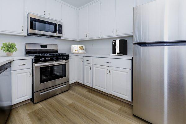 Kitchen with quartz countertops and stainless-steel appliances