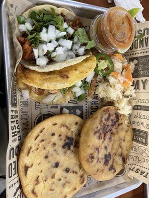 Fresh and tasty Chicken taco, Al Pastor Taco, pupusas (queso and frijoles)