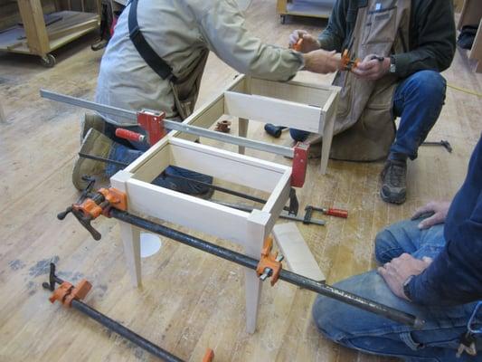 Woodworking 2's project almost finished!  A Coffee Table with tapered legs and drawer.