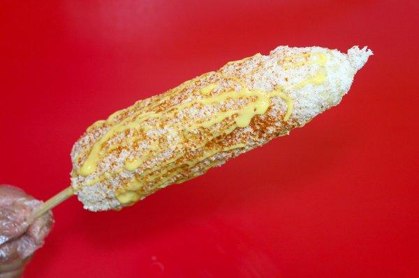 Corn on the cob layered with Mayo, cheese, butter, and spice!