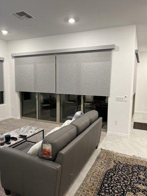 Motorized Light Filtering Roller Shades over large sliding doors with a 4" Fabric Cornice over the top!