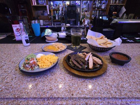 Rice,beans,pico,fajita combo,chips and salsa,flour tortillas and a cold beer...