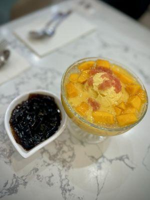 Special mango juice sago & pomelo with mango ice cream and a side of herbal jelly