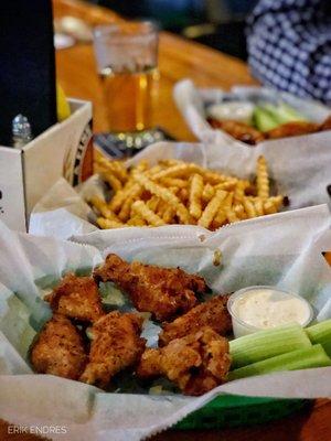 Six Asian dry rub wings, regular fries, and Carolina dry rub wings.