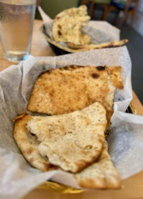 Garlic naan in back. And the raisin and cashew naan up close (I forgot the name).