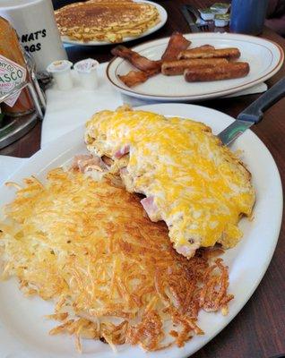 Best hash browns and Mom's Eggs (scrambled with cheese over English Muffin).