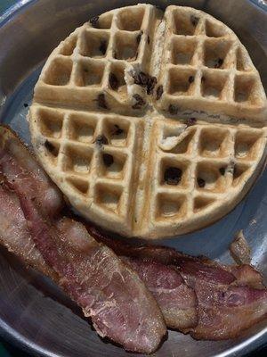 Chocolate chip waffle with side of bacon