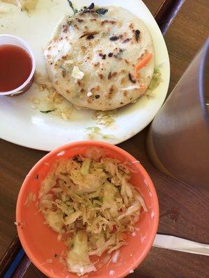 Pupusa and cabbage on the side