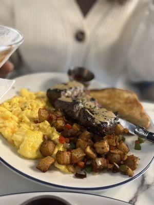 Steak and Eggs with seasoned potatoes