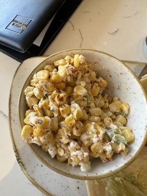 Refrigerated canned corn "salad" with weird taste.