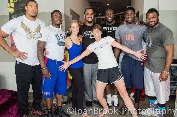 NFL players with owner Jennifer and Pam Leblanc