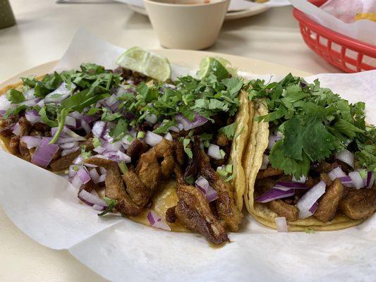 Juicy Pastor tacos with Cilantro and Red Unions