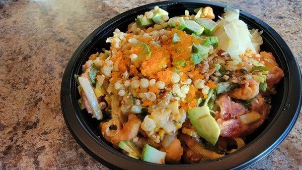 Custom poke bowl with spicy tuna and spicy shrimp