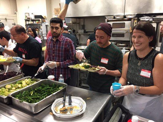 Our volunteers from Fight2Feed on the line serving Thanksgiving Dinner.