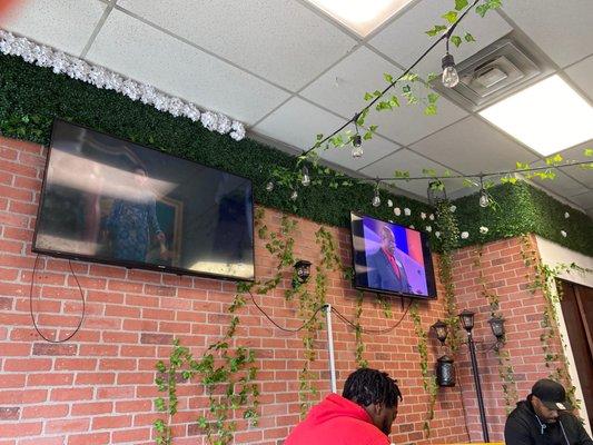 Waiting area equipped with televisions