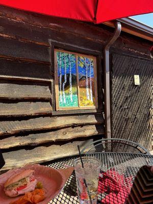 Back patio with painted glass windows