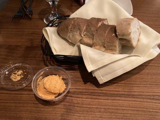 Fresh baked bread and a delicious sundried tomato butter. Butter was at room temp, so perfect!