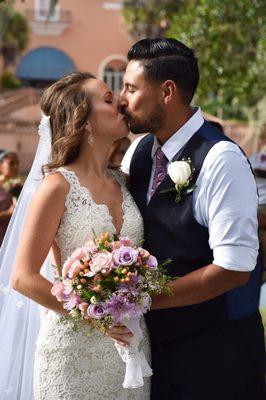 The wrap around the base of the flowers was done by us-quickly- we wanted to put it on there but if we didn't it was beautifully wrapped.