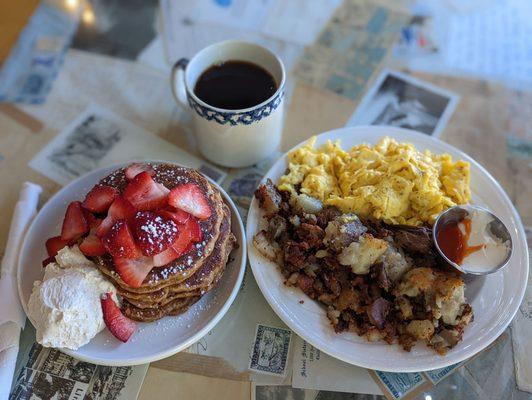 Sweet potato pancakes, eggs, breakfast potatoes, and coffee