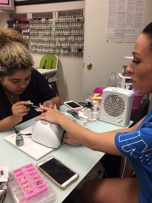 Daughter getting nails done for her birthday they were beautiful