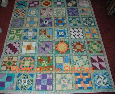 Custom Quilts made at Memories In Stitches. Includes embroidery and longarm services.